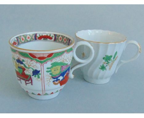 Two Barr Worcester Coffee  Cups.. One with a twisted fluted body decorated with green flower sprigs. The other decorated in '