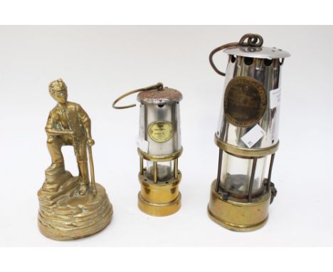 A miners lamp, type 6, together with another small miners lamp and a brass figure of a minor (3)  