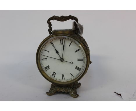 A Breuete brass mantle clock, raised foliate decoration, Roman numerals, key 