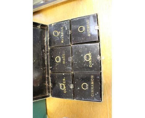 A vintage tin travelling spice box 