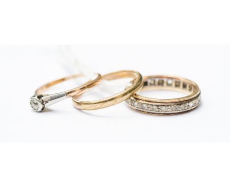 A group of three rings comprising two 9ct gold rings one set with white stones, along with a  14ct rose gold ring set with a 