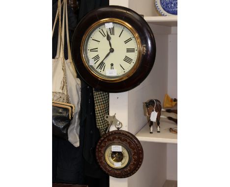 A 19th Century circular dial wall clock, white dial and black Roman numerals; together with an Edwardian circular barometer, 