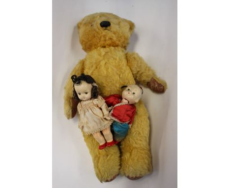 A Chad Valley teddy; together with a Mandarin doll and another 