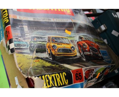 A boxed Scalextric Model Motor Racing Set, together with a boxed Subbuteo Continental Floodlight Edition game.