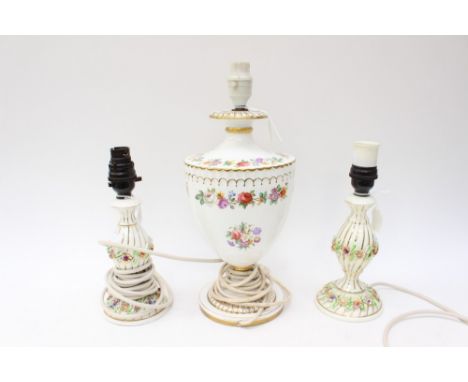 A Royal Crown Derby table lamp, together with a pair of continental porcelain table lamps (3)