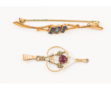 A 9ct gold Victorian pendant set with faceted amethyst with a 9ct gold bar brooch, set with rectangular blue stones, combined