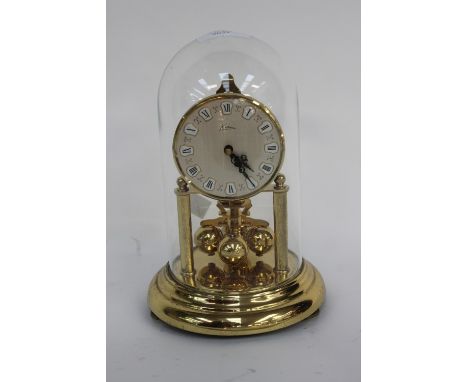 A German Kein clock under glass dome 