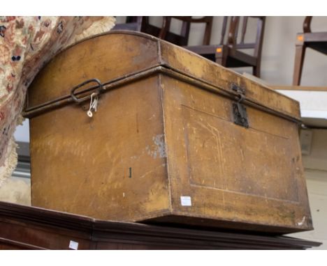 A metal dome topped trunk 