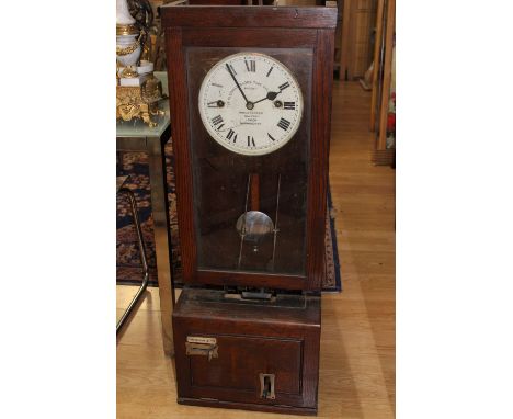 A mid 20th Century Gledhill Brook Time Recorder clocking in clock, with Roman numerals, oak case
