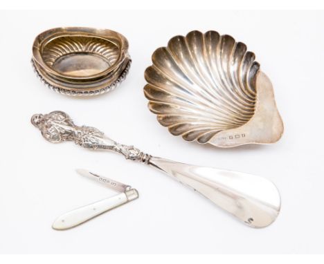  A shell shaped butter dish raised on ball feet, Birmingham 1905, a Birmingham salt (no liner) 1906, approx 1.74ozt/54.6gms, 