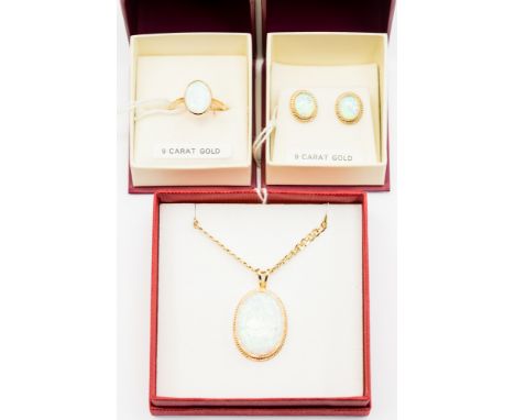 A suite of synthetic opal jewellery all set in 9ct gold, comprising an oval pendant with rope edge, pendant size approx 30mm 