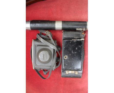 A 1920 folding Autographic Brownie No 2A, ball bearing shutter Pat Jan 7, 1913, together with a military torch 80460, Everead