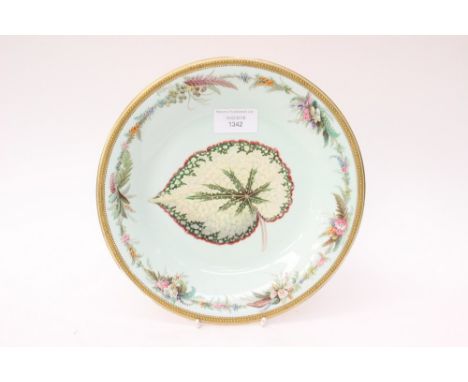 A Royal Worcester Aesthetic Movement cabinet plate, enamelled with leaf within floral garland border, impressed marks 