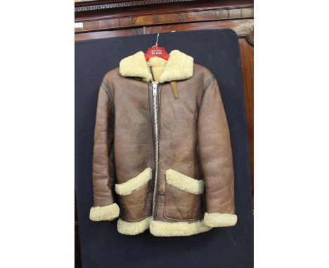 A ladies flying jacket with two patch pockets 1960/70 lined in sheepskin