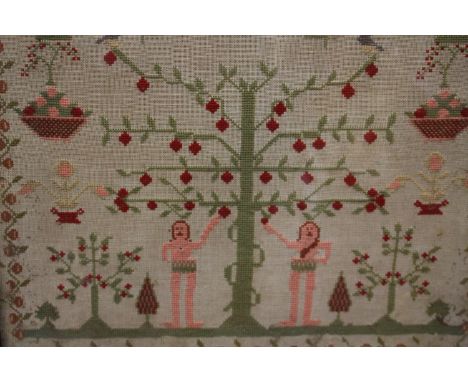 A 19th Century sampler depicting "Adam & Eve" scene, signed and dated 1832 , in oak frame 