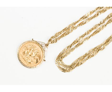 A half Sovereign pendant in 9ct gold mount and chain, chain length approx 20'', combined total gross weight approx 9.6 grams 