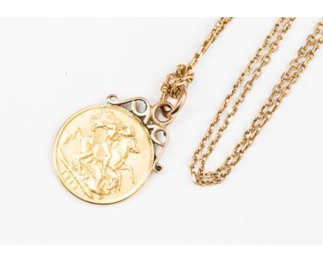 A full Sovereign pendant with 9ct gold mount on a 9ct gold long guard chain, approx chain length 52'', combined total gross w