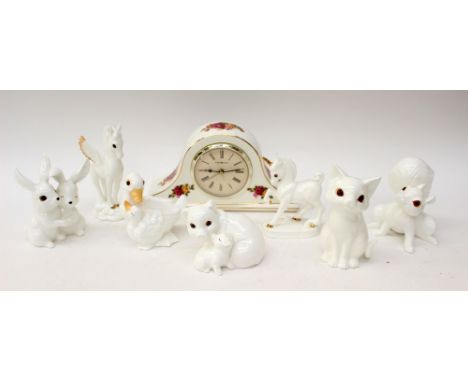 A Royal Albert 'Old Country Roses' clock, together with seven Royal Osborne animal figures (8)
