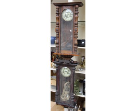 A Vienna wall clock with Roman numerals to dial and mahogany casing together with another similar,  (2)