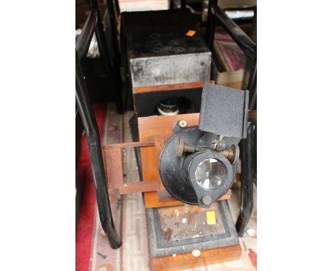 A large magic lantern projector; together with a box of slides 