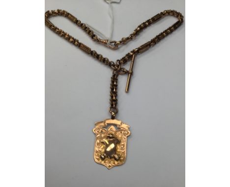 A 9ct rose gold fancy Albert link watch chain, marked 9ct, with T bar marked 9ct and CA&B, swivels marked  9ct, with fob, mar