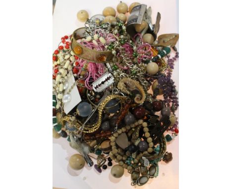 A bag of vintage costume jewellery