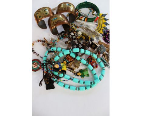  Ethnic bead work to include scarf clasps, pin with Rhodonite cabachon, bracelets, pendants, beaded necklaces (Native America