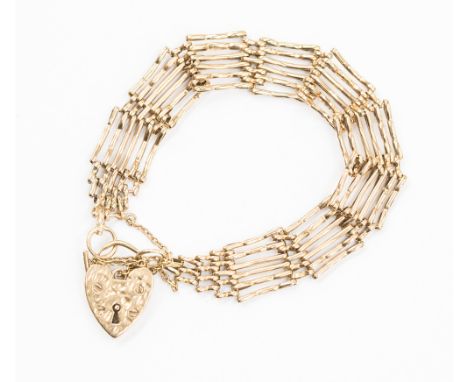 A 9ct gold six bar gate bracelet with padlock fastener, width approx 13mm, weight 17.3 grams approx 