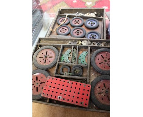 A vintage wooden cased Meccano set 