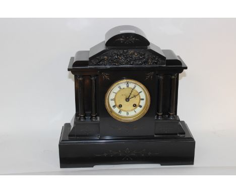  A Victorian black slate mantel clock, eight day movement 