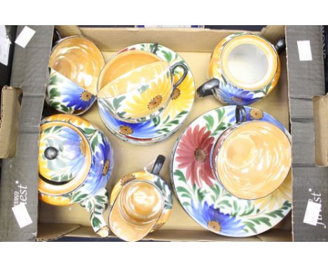 A Japanese porcelain tea service decorated with flowers (one box)
