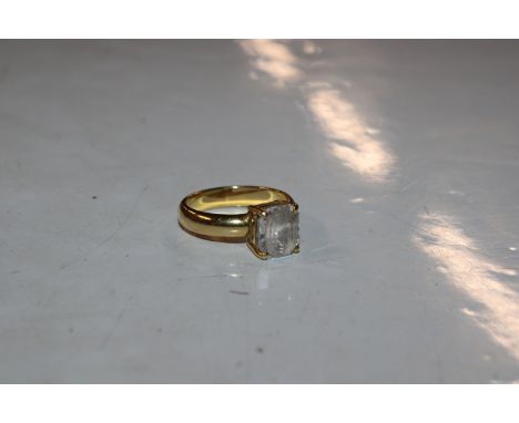 An 18ct gold ring set with white stones, 6gms total weight, ring size O