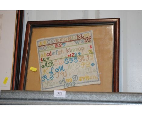 A small sampler dated 1883
