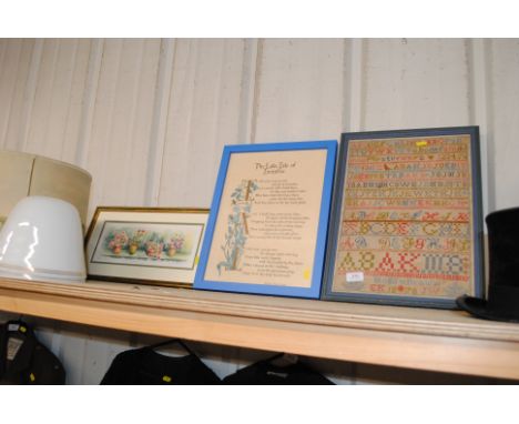 A framed and glazed sampler dated 1878; a framed and glazed text 'The Lake Isle of Innis Free' and a pencil signed floral pri