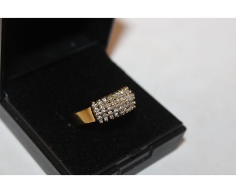 A yellow metal ring set with diamond cluster, 4.2gms total weight, ring size N/O