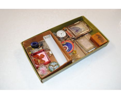A box containing miniature photo frames, a Mauchline ware box and cover, a Smiths pocket watch, glass paperweights and an ena