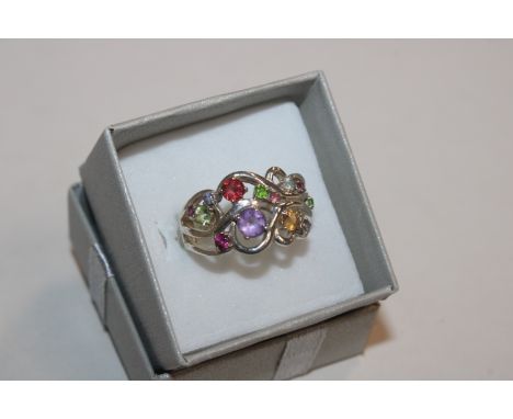 A Sterling silver multi gemstone including amethyst, garnet, peridot, citrine etc. ring, ring size N/O