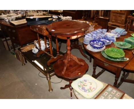 A pair of continental inlaid style tripod tables 