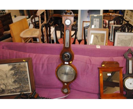 A 19th Century mahogany and satinwood strung banjo shaped barometer by Zambra, London