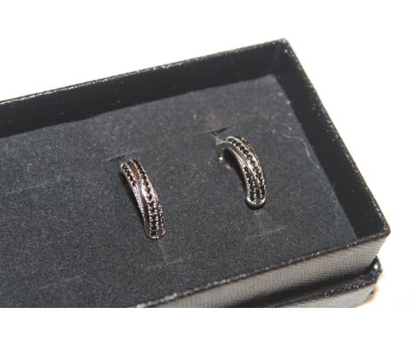 A  pair of Sterling silver and sapphire hoop earrings 