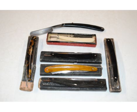 A collection of cut throat razors. This item can only be purchased by someone over the age of 18 and ID verification may be r