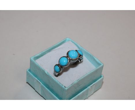 A large Sterling silver and turquoise ring, ring size N/O