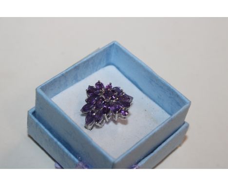 A Sterling silver and amethyst cocktail ring, ring size L/M