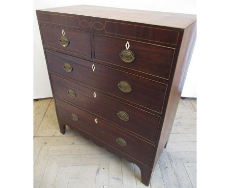 Regency mahogany chest, with boxwood strung frieze above two short and three long graduated cockbeaded drawers, brass D shape