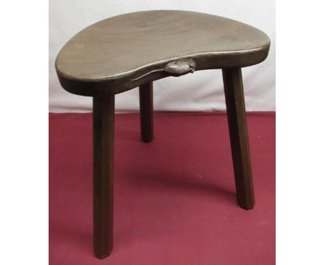 Robert Mouseman Thompson - Oak cow stool, kidney shaped top on three octagonal tapering supports, carved with signature mouse