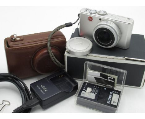 Leica D-Lux 3 digital camera in silver finish with Lecia fitted leather case, charger and four spare batteries with original 