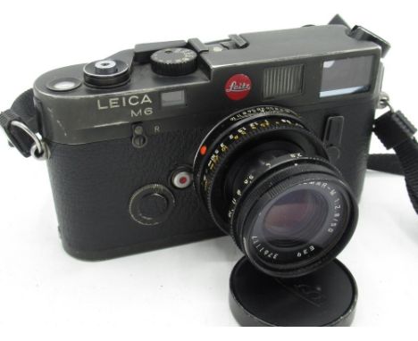Leica M6 in black finish with Leica Elmar 50mm F2.8 collapsible lens, camera serial no. 1704853 