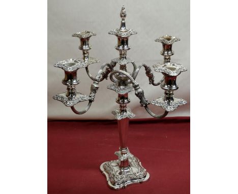 C20th Rococo style EPNS four light candelabra, three reeded scroll branches with urn sconces, on tapering column with stepped