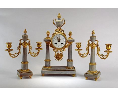 A 20th century Louis XVI style gray marble and gilt metal clock garniture, the clock with 3 1/2 inch garland decorated enamel