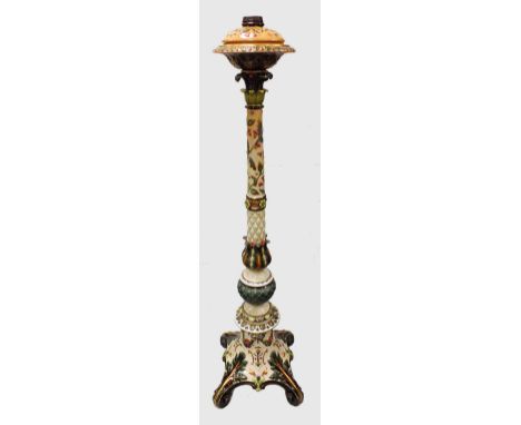 A Swedish Rorstrand majolica oil lamp standard, late 19th century, with ornate floral green, cream, and pink decoration on sc